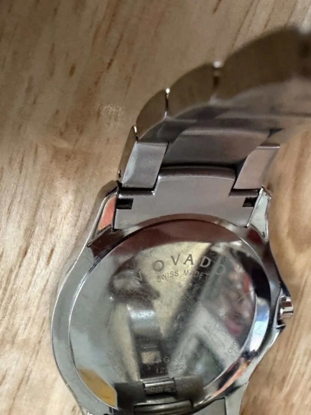 Movado Men's Stainless Steel Silver Watch with Black Dial